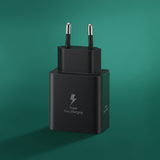 Black charging adapter with 'Super Fast Charging' text on a green background