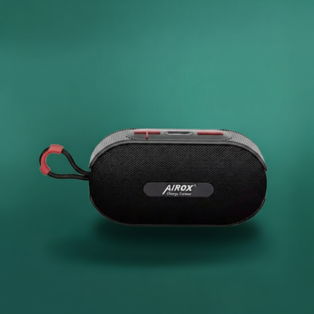 Black portable speaker with red accents on a teal background