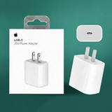 USB-C power adapter with packaging on a green background
