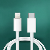 White cable with Lightning and USB-C connectors on a green background
