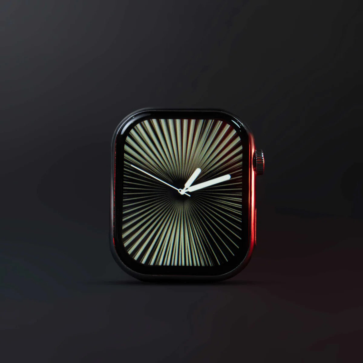 Smartwatch with a unique sunburst pattern on the screen against a dark background